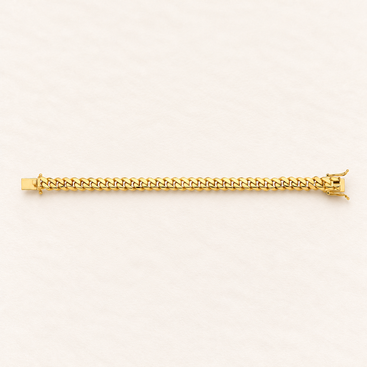 Bracelet Gourmette Signature — or jaune 9 carats, 10 mm