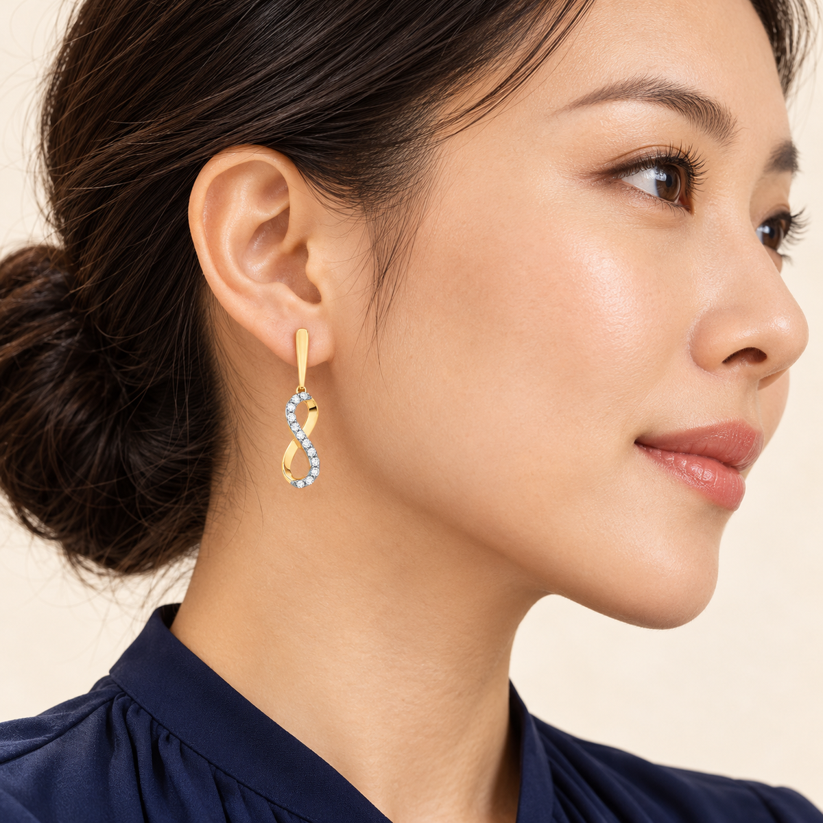Boucles d’oreilles Infini — or jaune 9 carats et diamants 0,25 ct