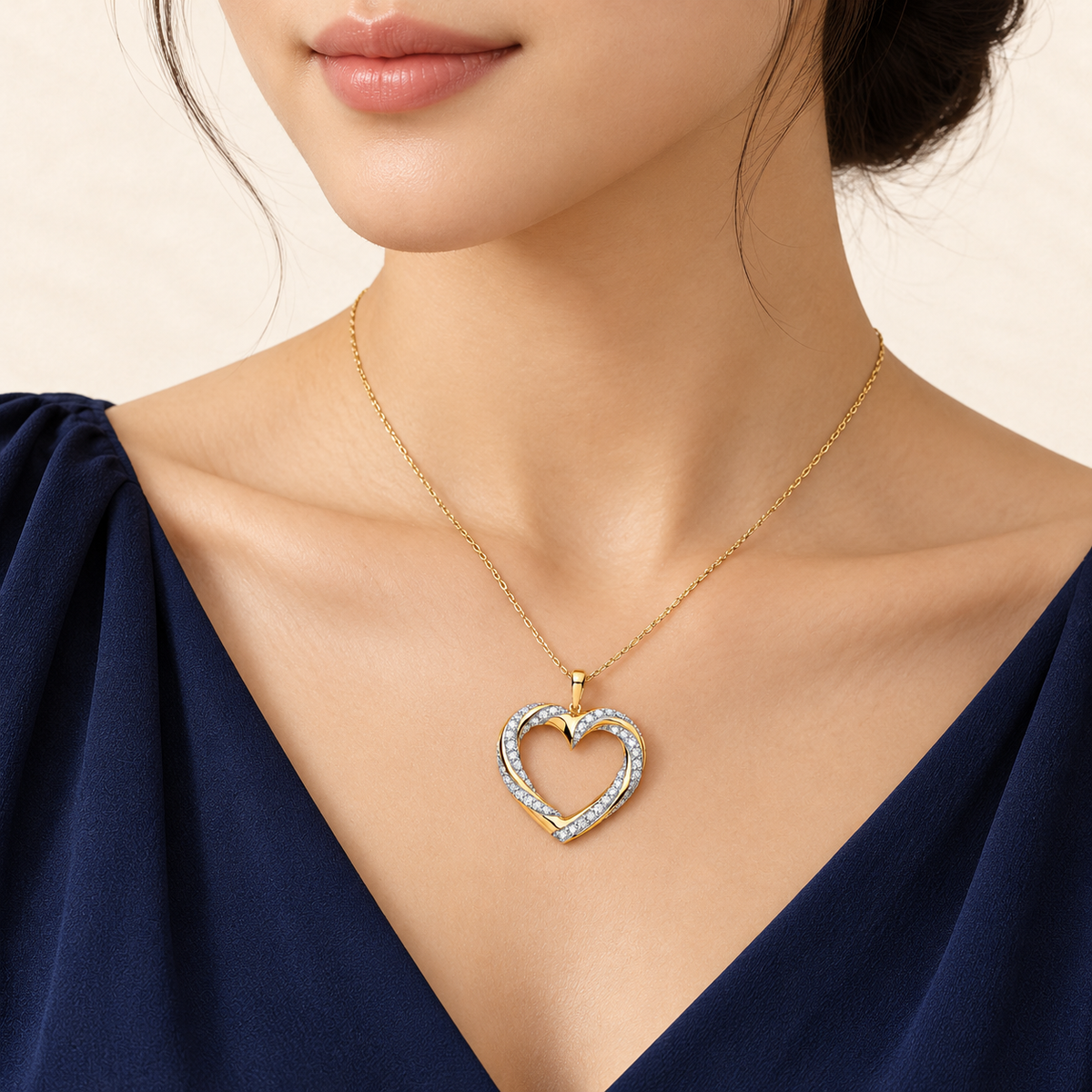 Pendentif Cœur Entrelacé — or jaune 9 carats et diamants 0,50 ct
