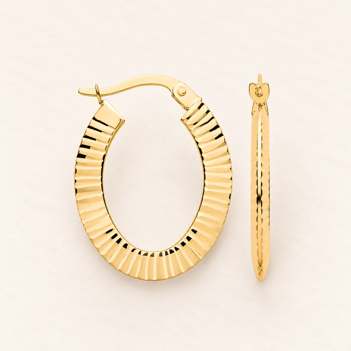 Créoles Ovales Côtelées — or jaune 9 carats