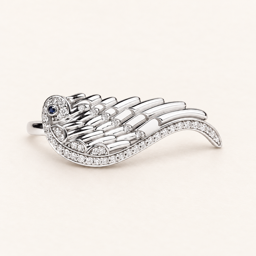 Wing ring in white gold, diamonds and sapphires — 18K